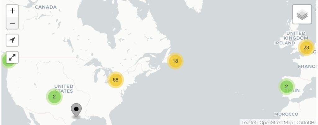 Carte digitale du monde montrant une partie du Canada, des États-Unis et de la Grande-Bretagne. Des cercles de différentes couleurs montrent les endroits enregistré sur Church Atlas. 